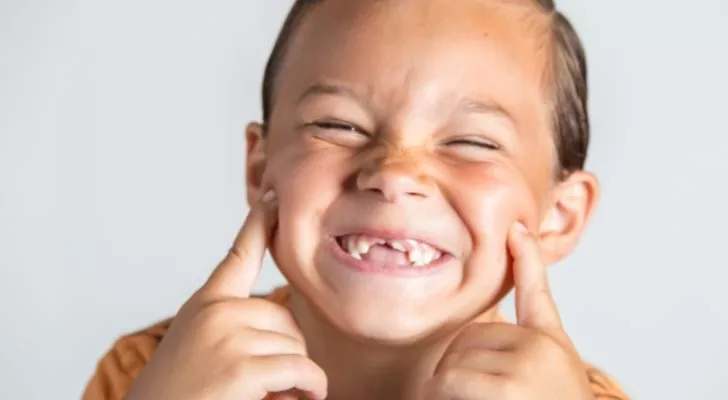 A boy with missing teeth