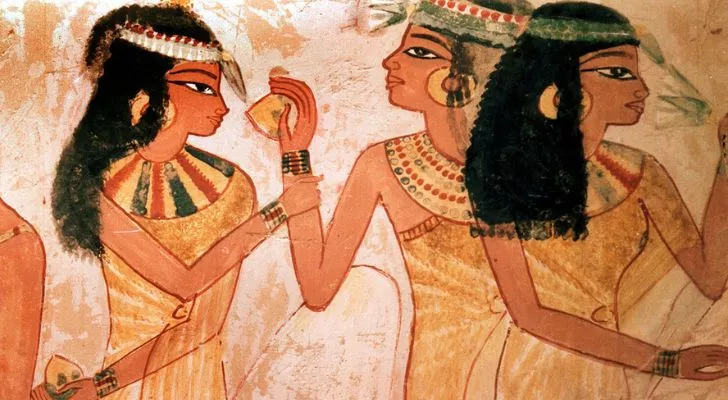 Ancient Egyptian art showing women using perfume