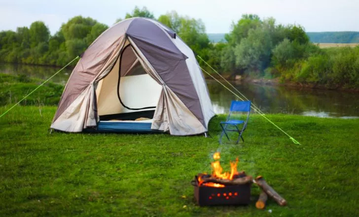 A tent by the lake.