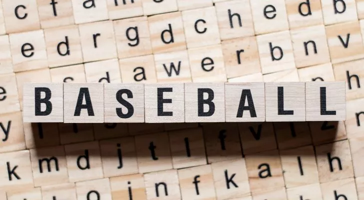 The word "baseball" written with wooden blocks