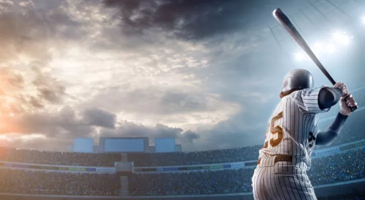 A baseball batter ready to hit a ball