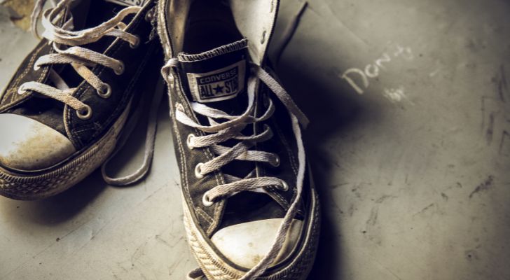 Filthy old black Converse Chuck Taylors
