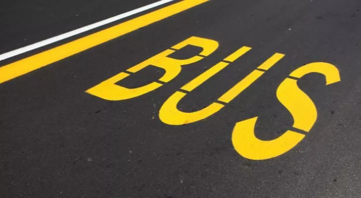 The word bus on the tarmac of a bus lane