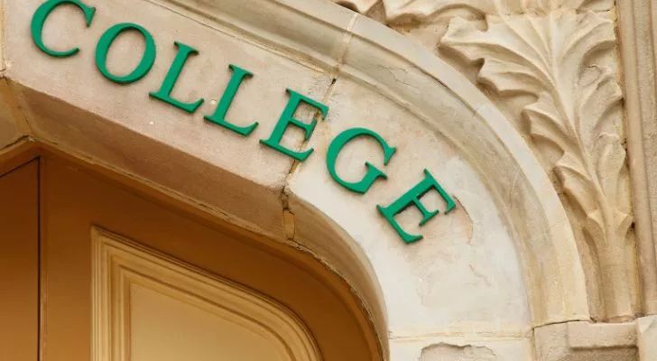 A sign reading "College" on an archway