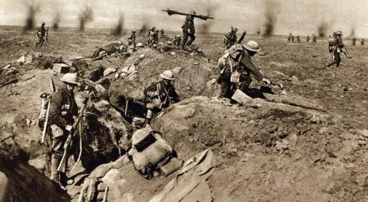 A trench at the Somme with equipment and men scatter all around