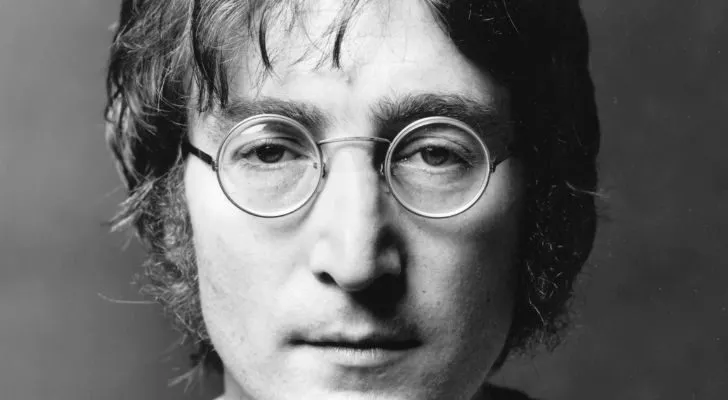 John Lennon wearing glasses