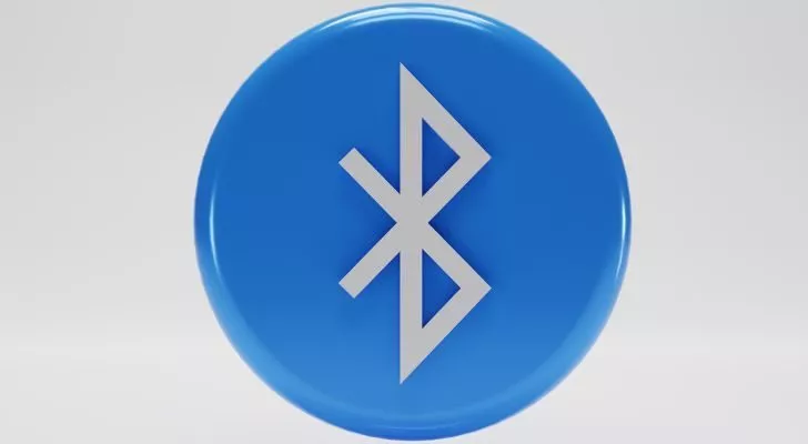 The Bluetooth logo on a blue circle