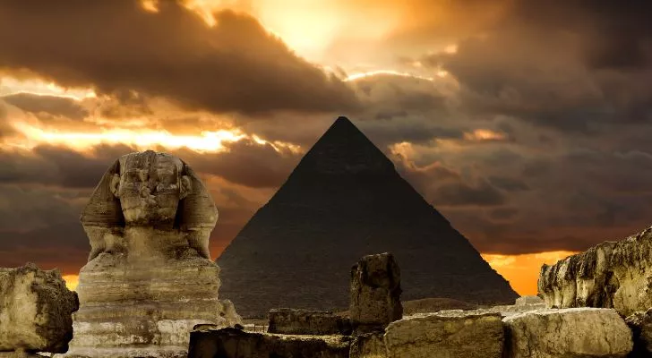 Egypt's Shinx and the Great Pyramid of Giza at sunset.