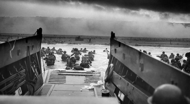 A view from a boat of US G.I.s landing on Omaha Beach during World War II
