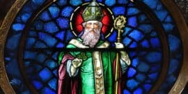 Stained glass window depicting Saint Patrick in traditional bishop attire holding a shamrock and a crosier
