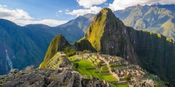 Machu Picchu, an ancient Incan city with terraced architecture and mountainous backdrop in Peru