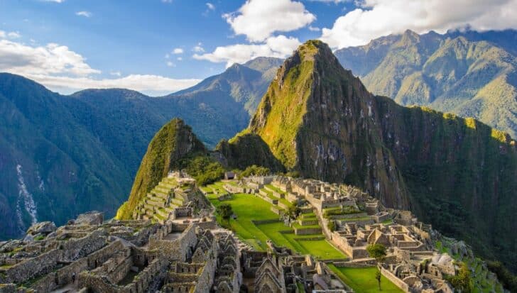 Machu Picchu, an ancient Incan city with terraced architecture and mountainous backdrop in Peru