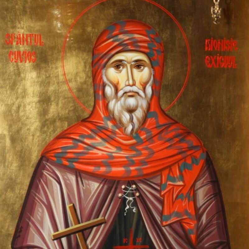 Illustration of a monk, Dionysius Exiguus, wearing a red and striped robe with a cross