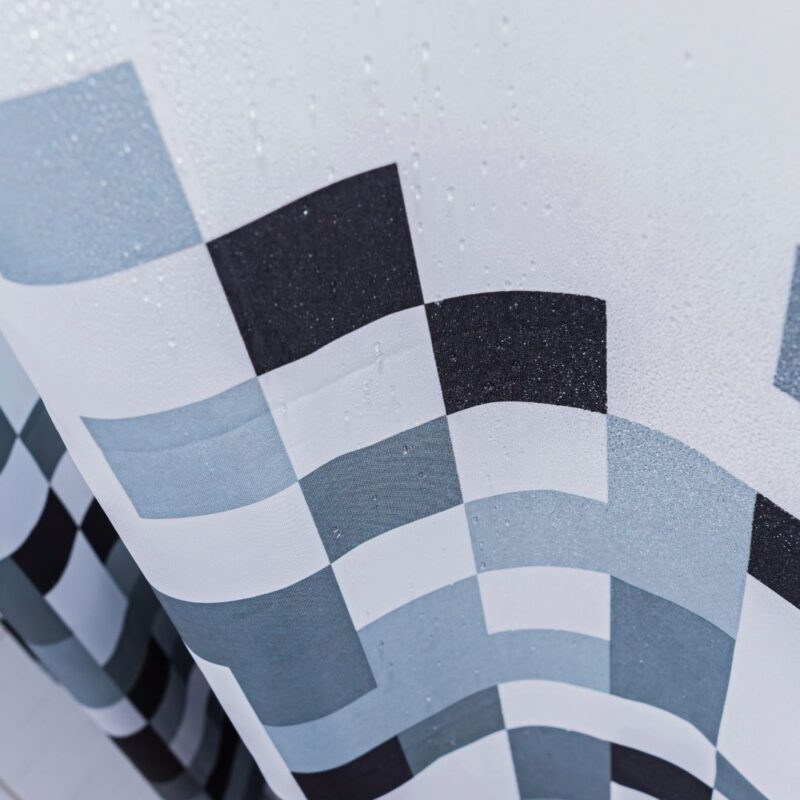 Shower curtain with alternating black and white checkered pattern