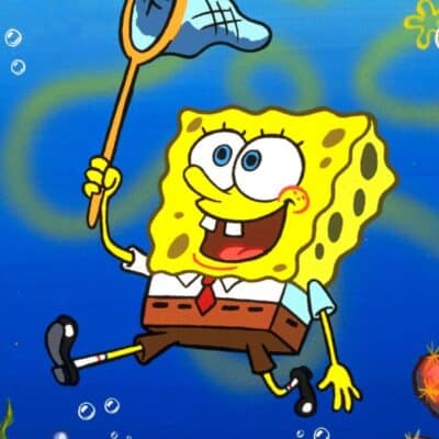 SpongeBob SquarePants, wearing his usual attire of a white shirt, red tie, and brown square pants