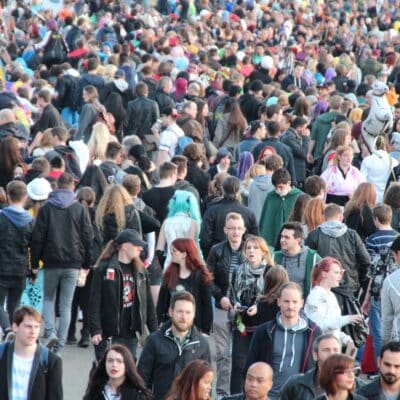 A crowd of people walking together