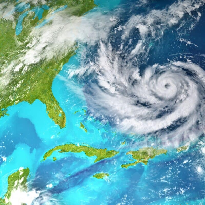 Satellite view of a large hurricane swirling over the Atlantic Ocean near the southeastern United States
