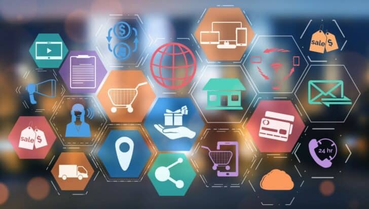 Hexagonal icons representing various concepts like shopping carts, globe, credit card, megaphone, and email 