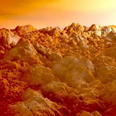 Rugged, rocky Martian landscape under a yellow-orange sky