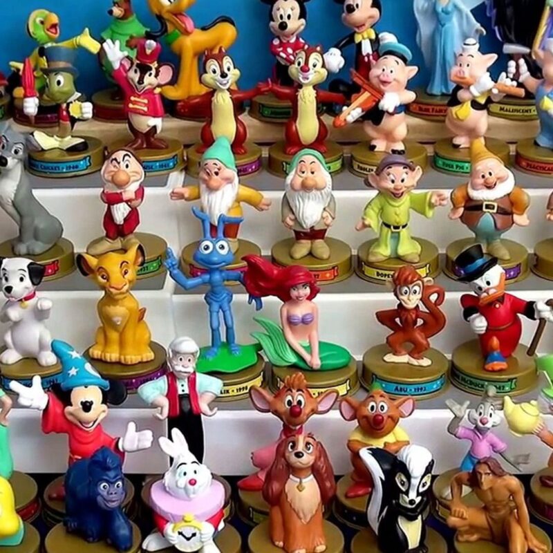 Colorful collection of Disney character toys from McDonald’s Happy Meals