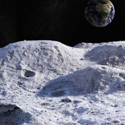 Lunar surface dust and small craters, Earth visible above