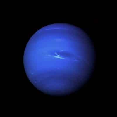 Neptune globe showing the Great Dark Spot storm and faint cloud bands