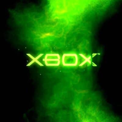 Glowing green Xbox logo surrounded by a smoky, nebulous background