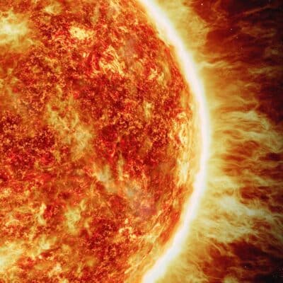 Close-up view of the Sun with glowing solar flares and surface detail