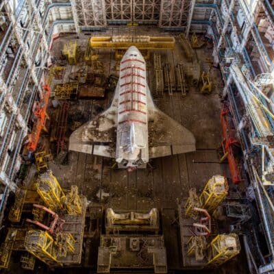 An abandoned Soviet space shuttle, closely resembling the American Space Shuttle design