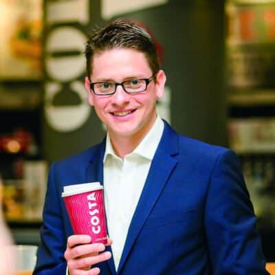 Gennaro Pelliccia holding a Costa coffee cup