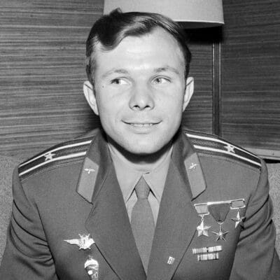 Yuri Gagarin, the first man in space, wearing a Soviet military uniform adorned with medals