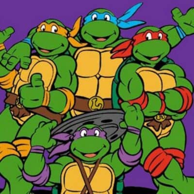 Teenage Mutant Ninja Turtles smiling and posing in colorful masks