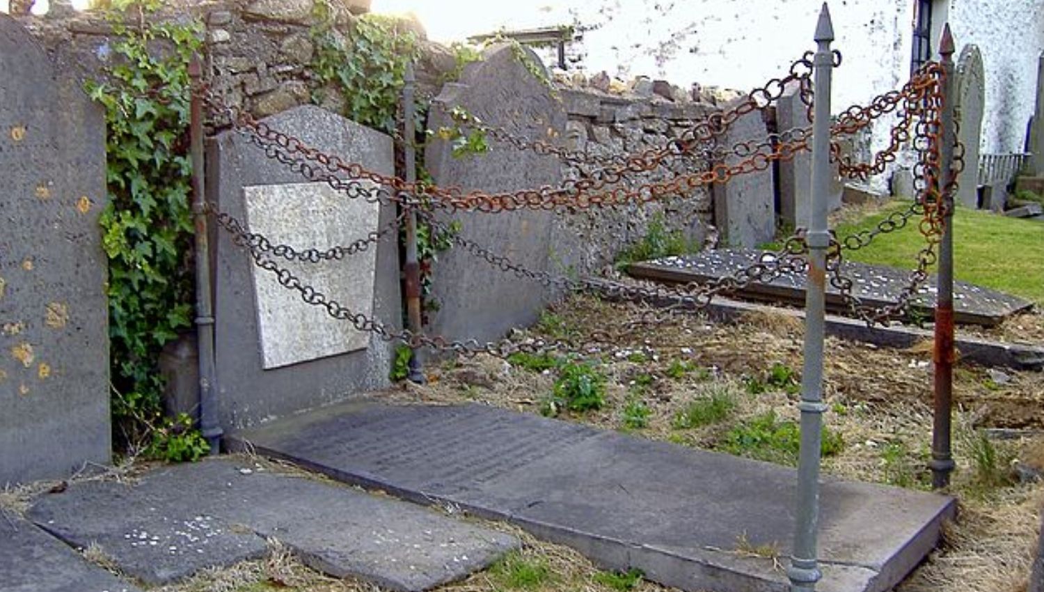 the grave of a suspected vampire, with chains all around it