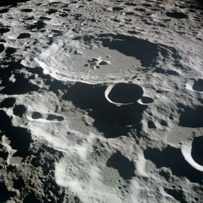 Shadowed craters near the Moon’s south pole with sunlight along crater rims