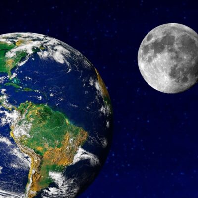 Earth and the Moon in space, showing size comparison