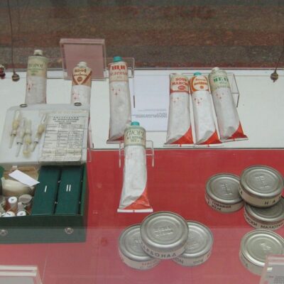 Soviet space food tubes and canned meals displayed in a museum case