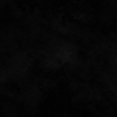 Completely black space with faint dark textures