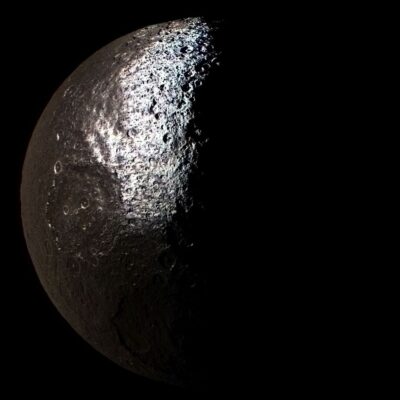 Saturn’s moon Iapetus showing bright and dark hemispheres