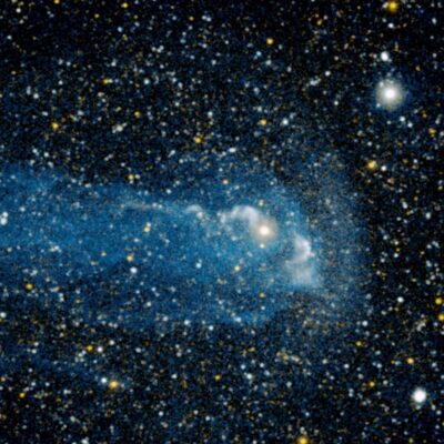 Mira star with its bright glowing tail amid dense star field