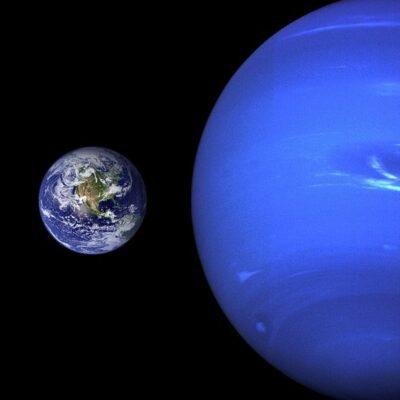 Earth and Neptune shown side by side to compare their sizes