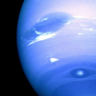 Bright white cloud known as Scooter above Neptune's dark stormy atmosphere