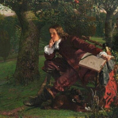 Young Isaac Newton sits under an apple tree with an open book and telescope