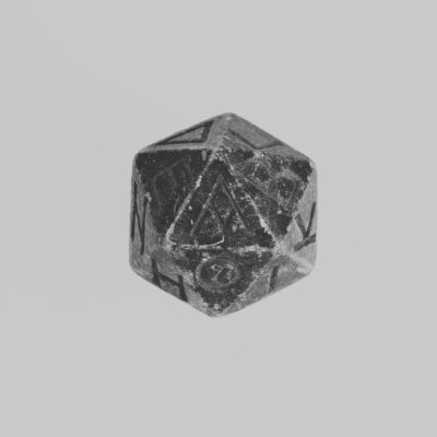 Ancient 20-sided die with Greek letters carved into each face