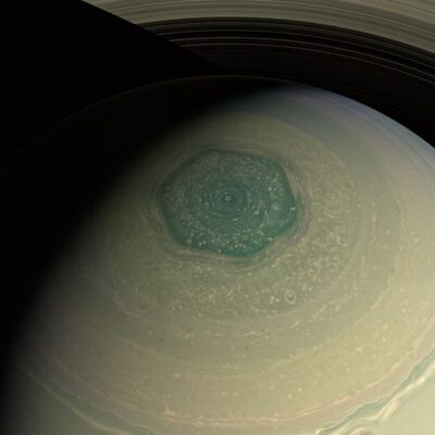 Hexagonal storm at Saturn’s north pole with its rings in the background