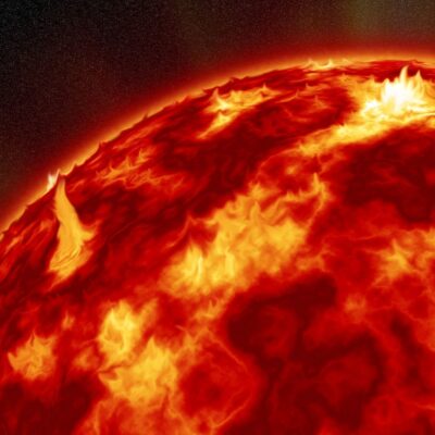 Close-up of the Sun’s surface with intense solar flares and plasma activity