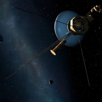Voyager 2 spacecraft passing near Uranus in deep space