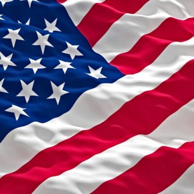 Close-up of a waving United States flag with stars and stripes
