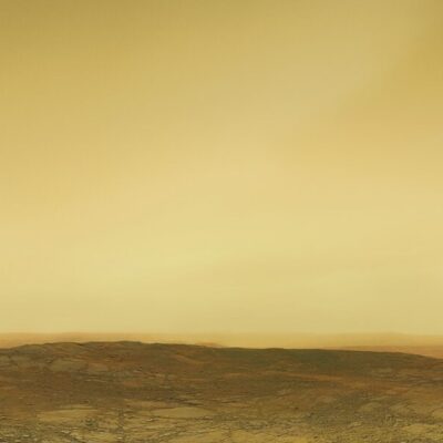 Rocky terrain under thick yellowish sky on Venus’s surface