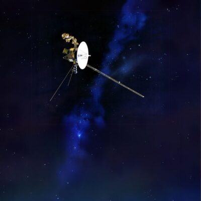 Voyager 1 space probe floating in deep space with stars in the background