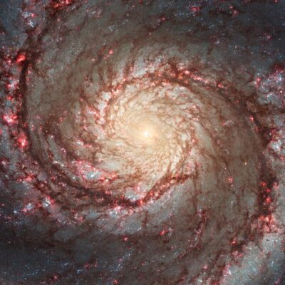 Spiral structure of the Whirlpool Galaxy with glowing star clusters and dust lanes